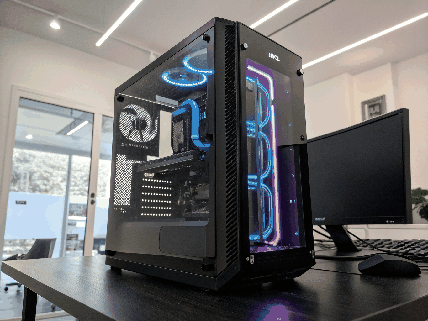 Custom high-performance desktop tower with liquid cooling and glass panel